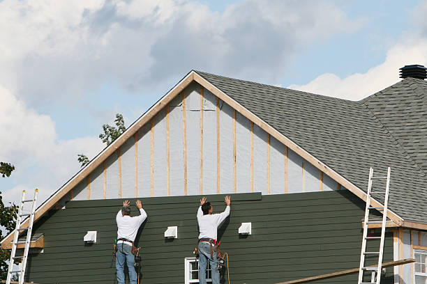 Professional Siding Contractor technician working in Harpster, OH